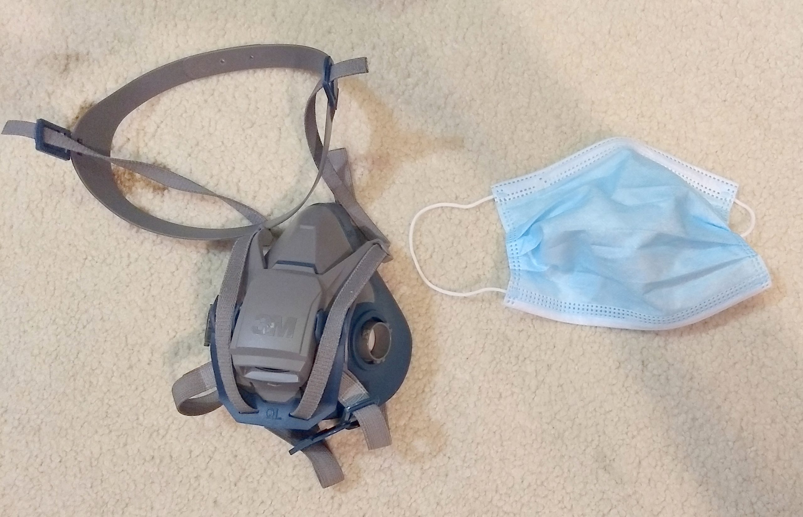 The 3M 6500 series vs. the simple surgical mask